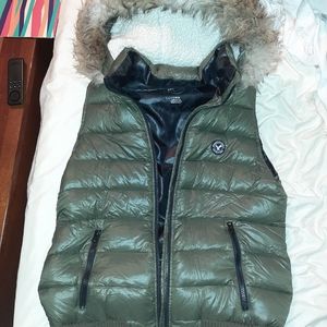 Green vest with fur hood